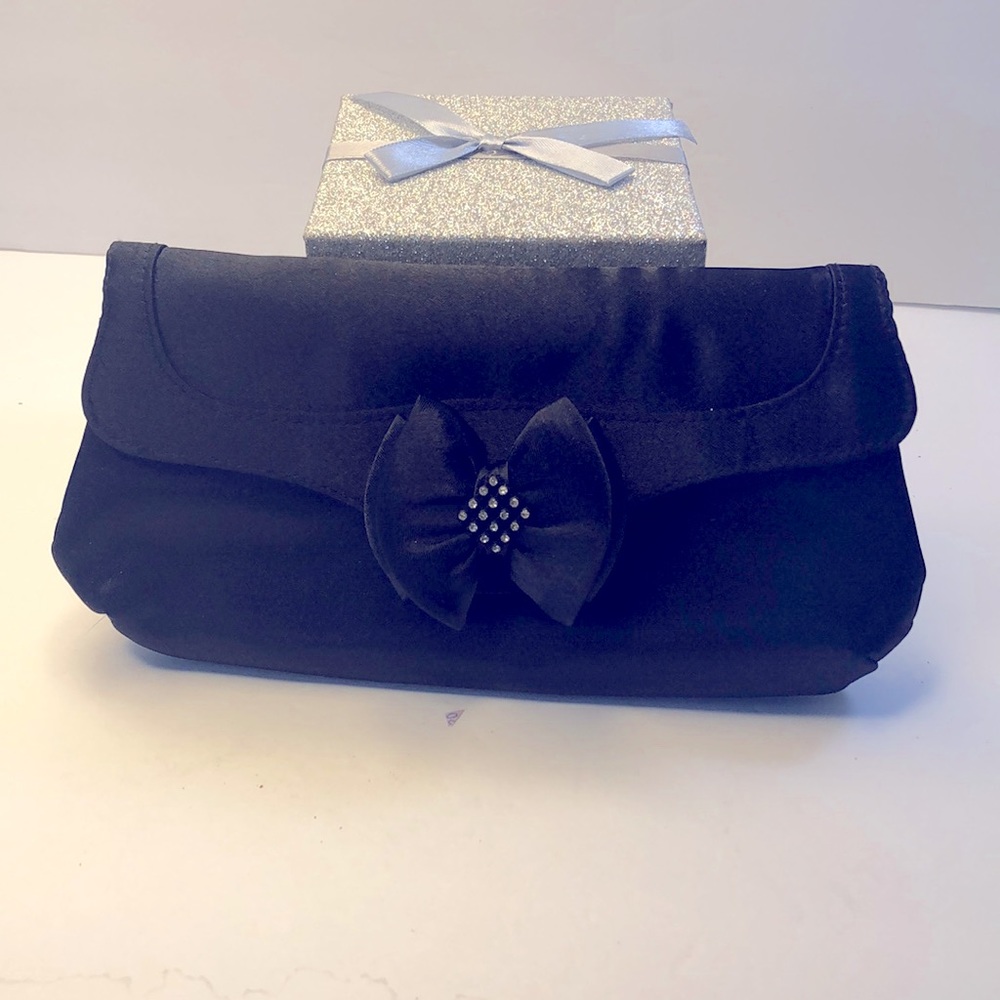 Black Clutch purse with bow and sparkle accents